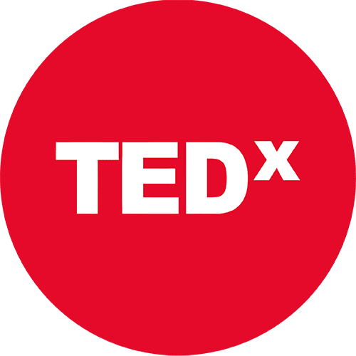 Logo de TEDx, plataforma internacional de conferencias e ideas innovadoras, destacando la participación e inspiración de KOLI dentro de la escena cultural y gastronómica.