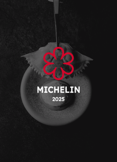 A plate featuring an artistic design on a dark background that incorporates the Michelin Guide 2025 logo, highlighting KOLI as a Michelin-starred restaurant.
