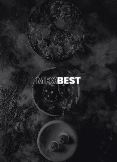 KOLI dishes amidst culinary smoke featuring the MEXBEST logo, an event that recognizes the excellence of Mexico’s top restaurants and chefs.