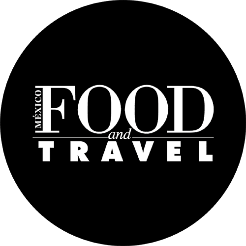 Logo of Food and Travel magazine, an international publication focused on culinary and travel experiences that has highlighted KOLI for its culinary offerings.